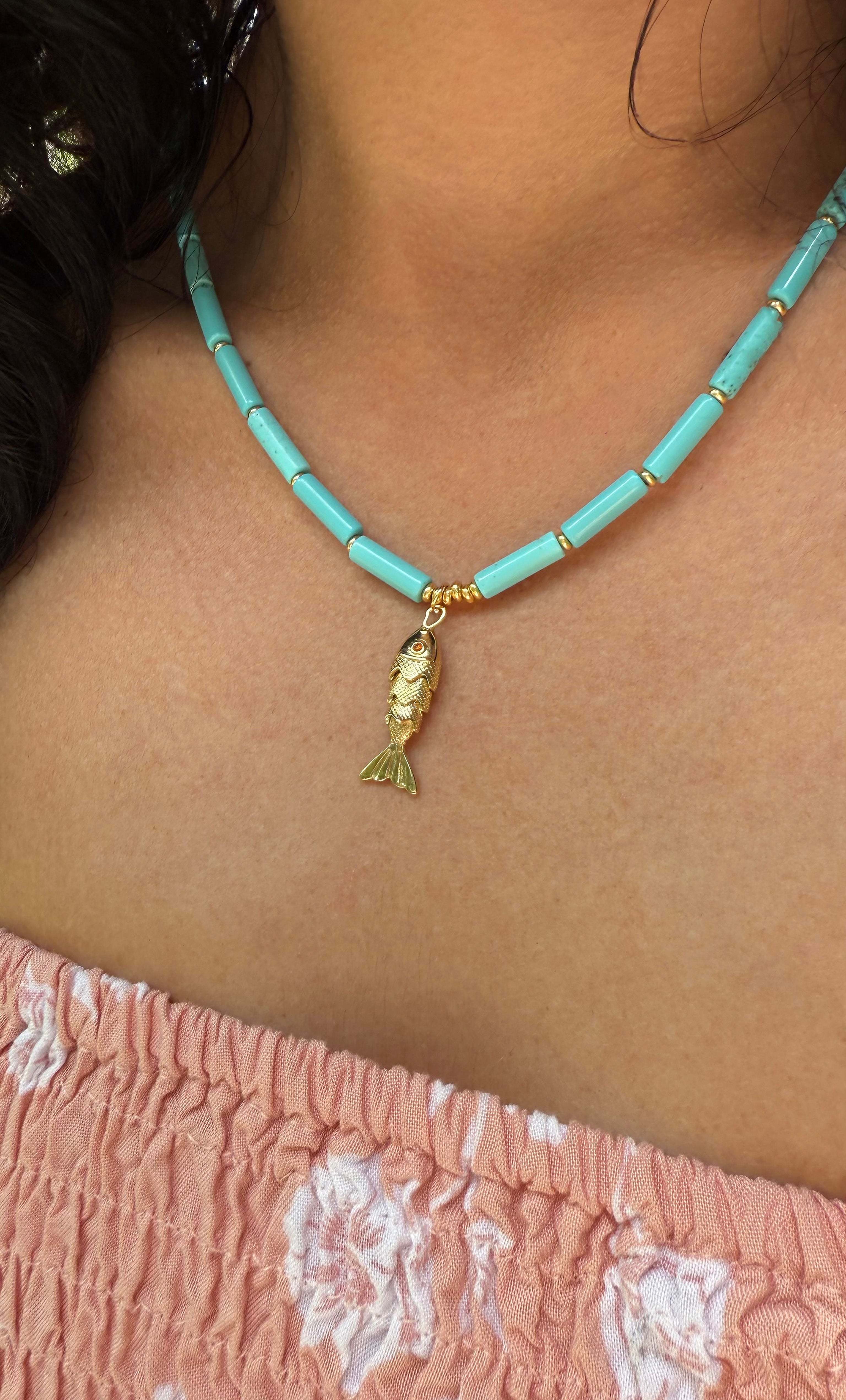 The Tunik Howlite Beaded Fish Charm Necklace