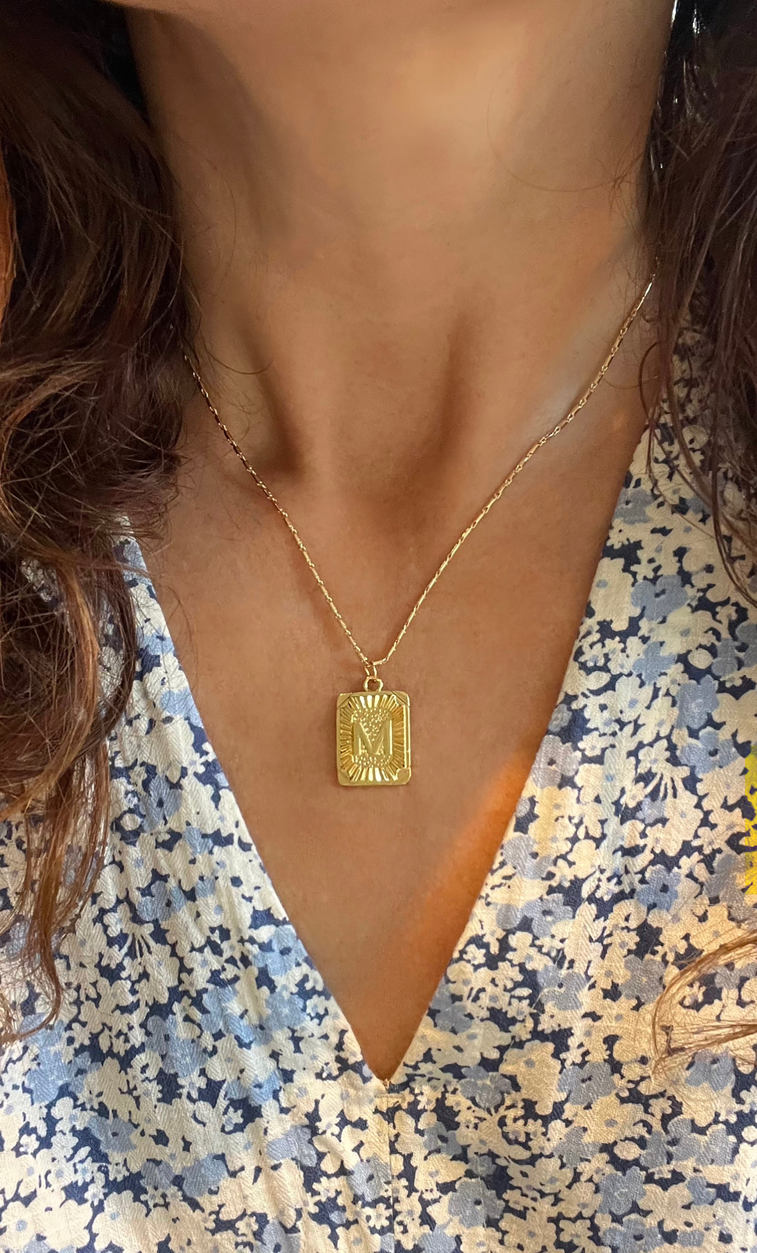 The Tunik Namesake Charm Necklace