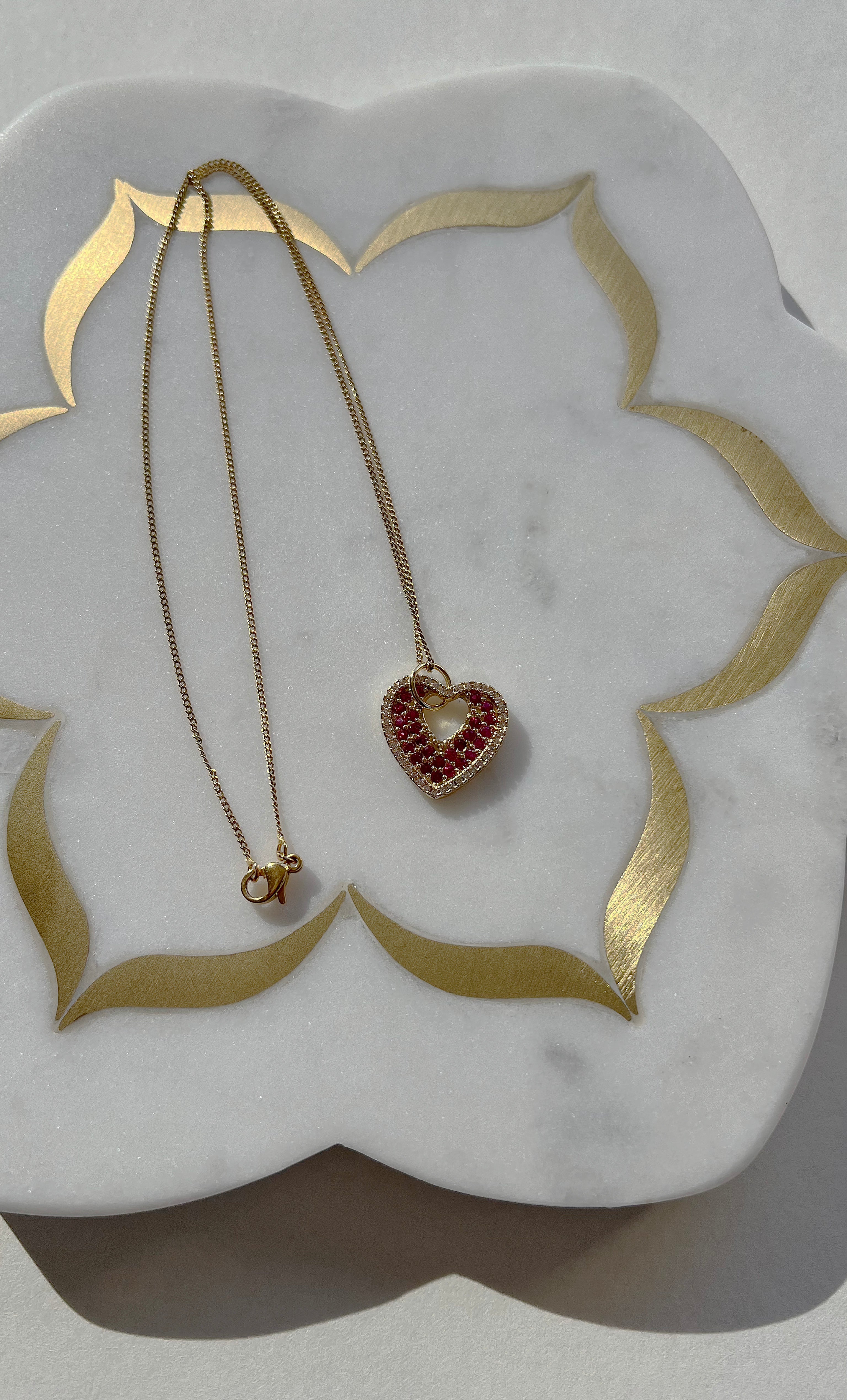 The Tunik Roaming Hearts Necklace